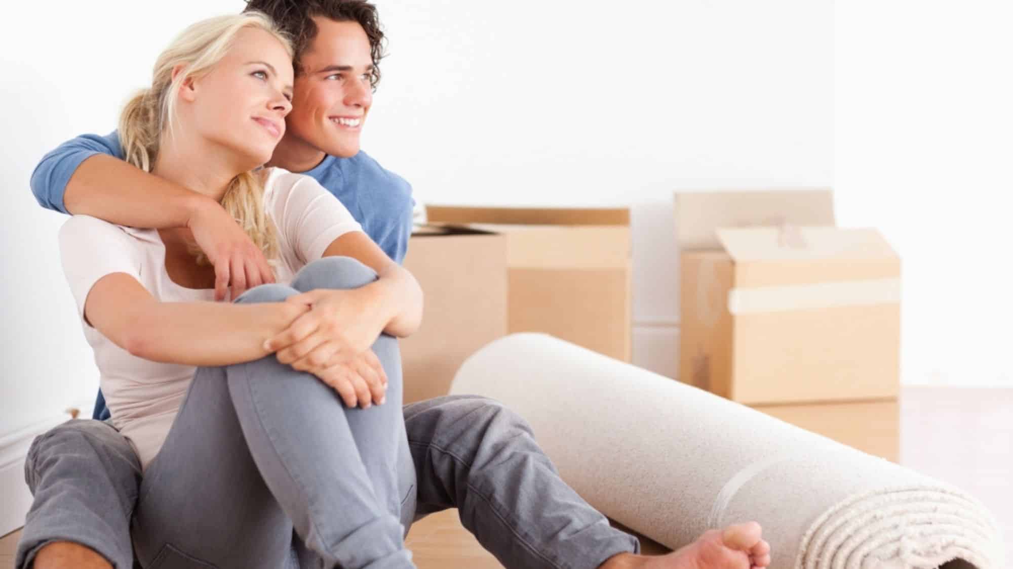 Couple sitting in new home after a Cairns building inspections report
